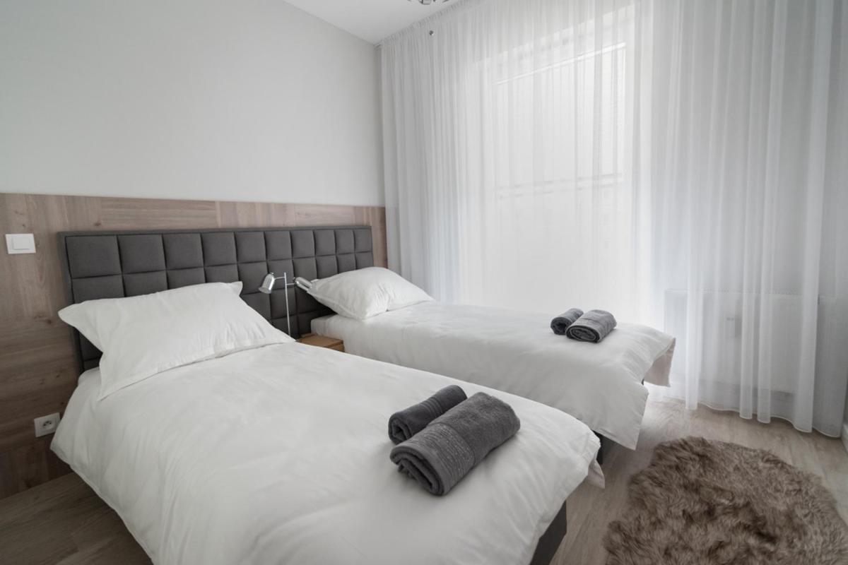 オルシュティンApartament Tuwima Parkアパートメント エクステリア 写真